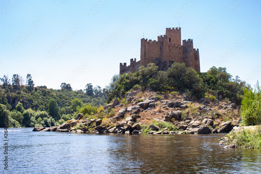 THE RUINS OF A MEDIEVAL CASTLE ALMOUROL ON THE ISLAND IN THE MIDDLE OF RIVER TAGUS (TAJO, TEJO), PORTUGAL 
