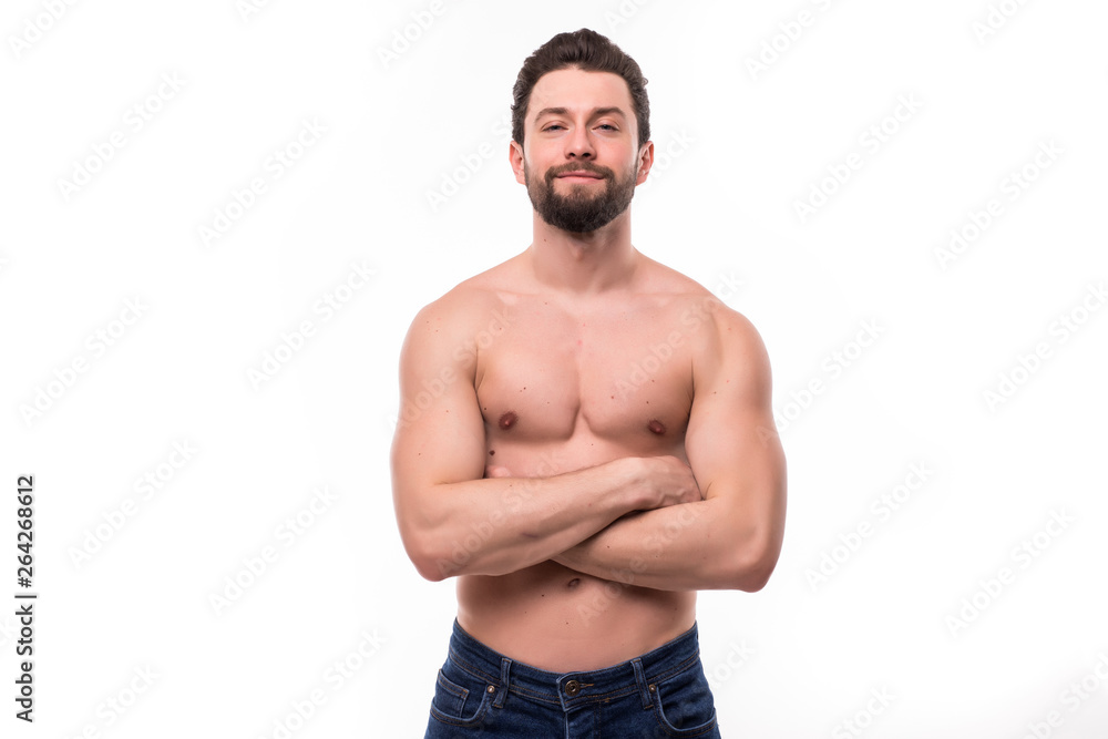Portrait of a well built shirtless muscular man against on white background