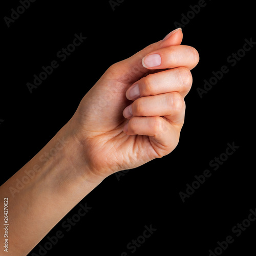 Woman hand showing picking up pose or holding something © Vasyl Onyskiv