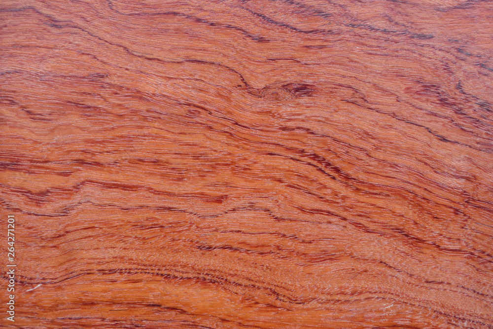 Surface texture of natural cherry veneer for design and decoration.