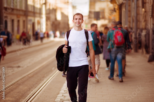 Young traveler man walk alone by old europen street