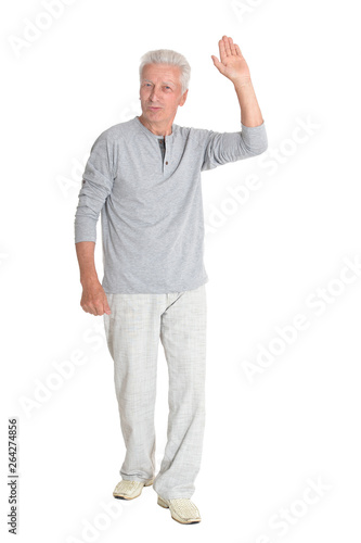 Portrait of successful senior man posing on white background