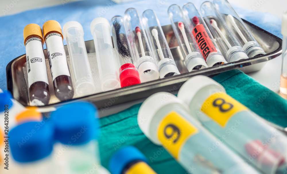 blood sample from glass bottle in Criminalistic Lab, conceptual image blood sample from glass bottle in Criminalistic Lab, conceptual image