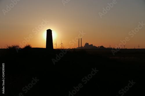 Evocative sunset over powerplant Amager F  lled Copehagen Denmark