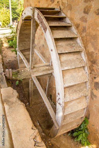 Wooden water wheel on an old farm