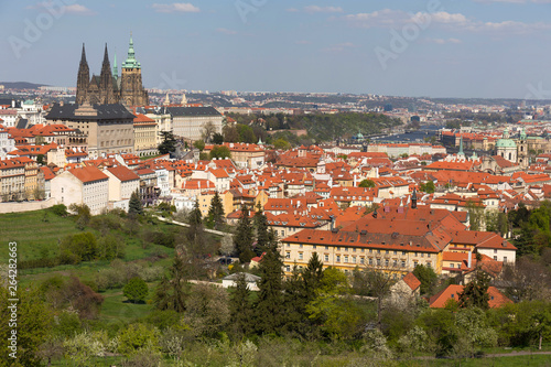 Spring Prague City with gothic Castle and the green Nature and flowering Trees, Czech Republic © Kajano