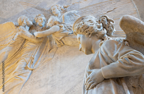 CATANIA, ITALY - APRIL 7, 2018: The detail of funeral monuments of opera composer Vincenzo Bellini in Cattedrale di Sant'Agata by Giovanni Battista Tassara (1876).