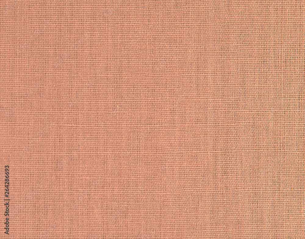 Fototapeta premium Textured background of brown natural textile 