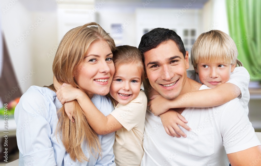 Beautiful smiling Lovely family indoors Beautiful smiling Lovely family indoors