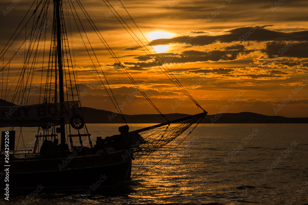 Sunset in Zadar, Dalmatia, Croatia with wooden ship