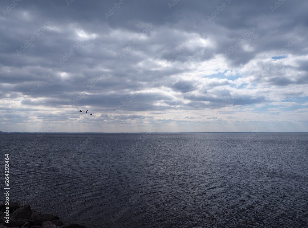Fototapeta premium Dark sky over the sea