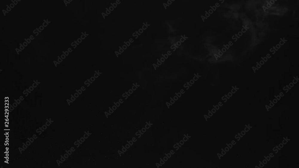 White water vapour on a black background. Close-up shot 4k White water vapour on a black background. Close-up shot 4k