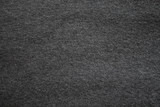 grey background. abstract texture of fleecy knitted fabric.