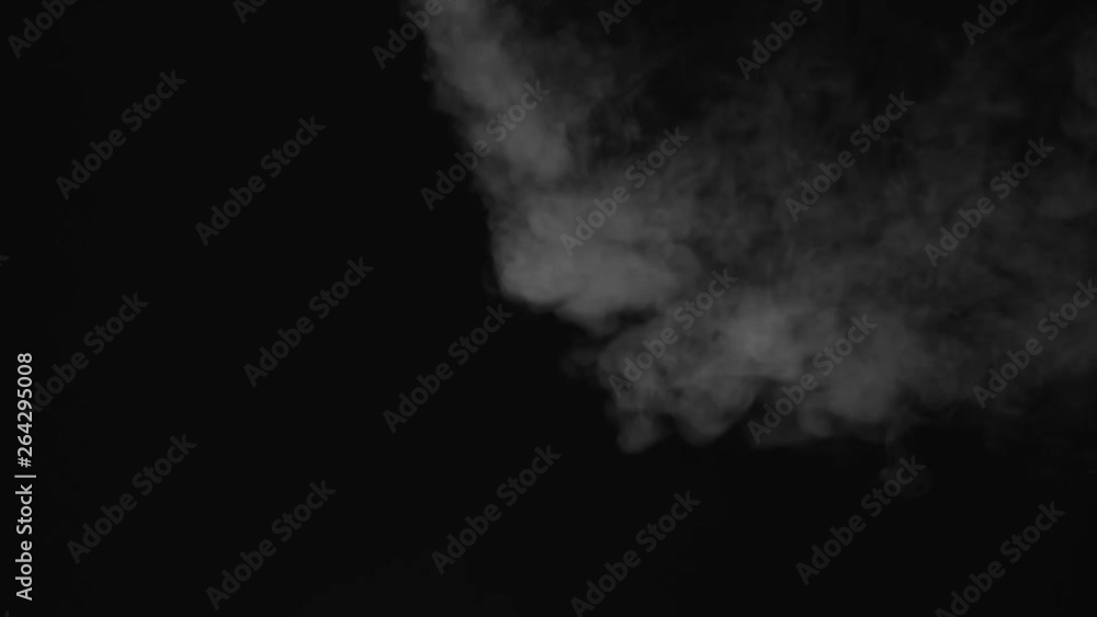 White water vapour on a black background. Close-up shot 4k White water vapour on a black background. Close-up shot 4k