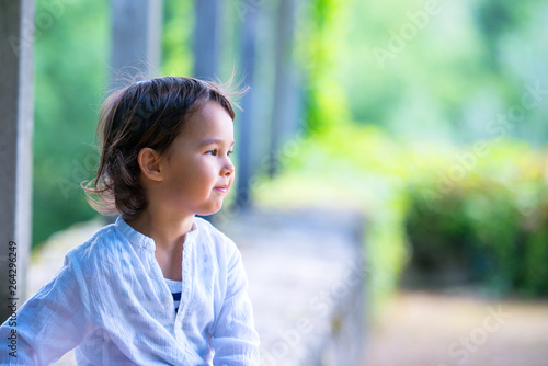 Little girl with white shirt having fun