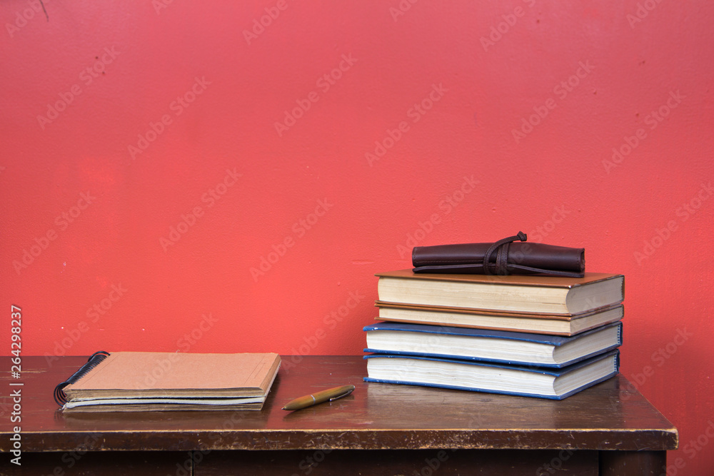 table with books and other elements table with books and other elements