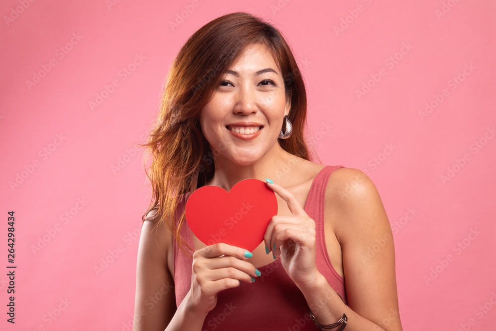 Asian woman with red heart. Asian woman with red heart.