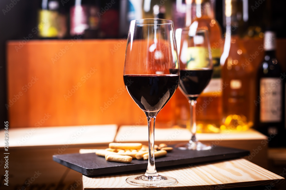 Glass of red wine prepared for tasting in a Europe winery. Copy space Glass of red wine prepared for tasting in a Europe winery. Copy space