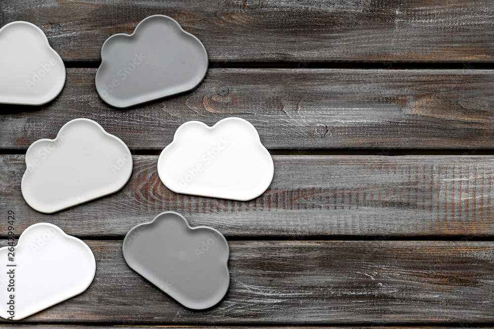 cloud service concept with clouds on wooden background top view mockup cloud service concept with clouds on wooden background top view mockup