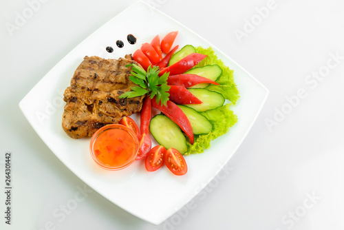 steak meat prepared with fresh vegetables 