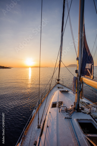 Sailing boat in the sea during awesome sunset. © Max Topchii