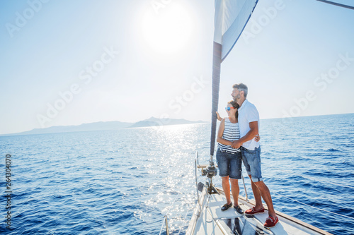 Romantic couple relaxing on yacht in Greece