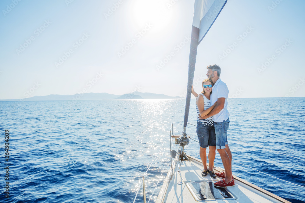 Romantic couple relaxing on yacht in Greece