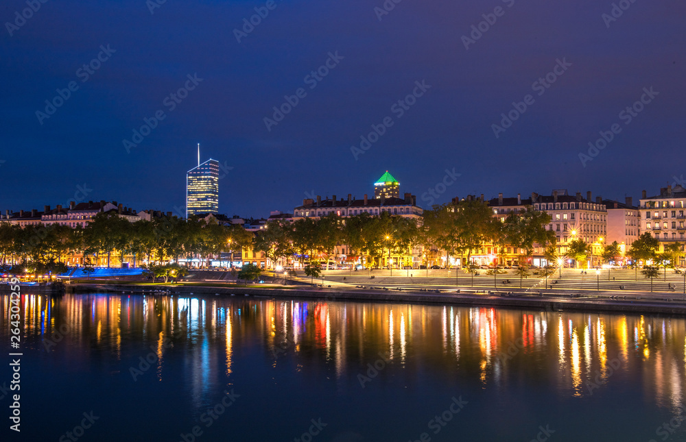 View of Rhone river in Lyon at night, France