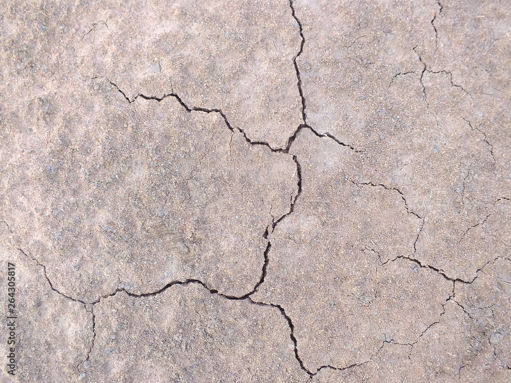 Obraz premium Dry soil surface due to lack of rain