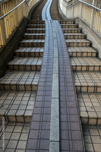Steps and ramps of a pedestrian bridge