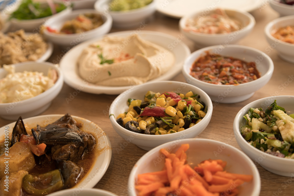 Close Up View of Various White Bowls of an Arab Salad Close Up View of Various White Bowls of an Arab Salad