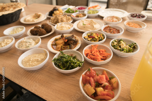 View of Large Table with Arab Salad and PIta Bread Basket