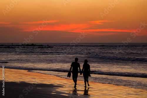 Sunset walk on the beach