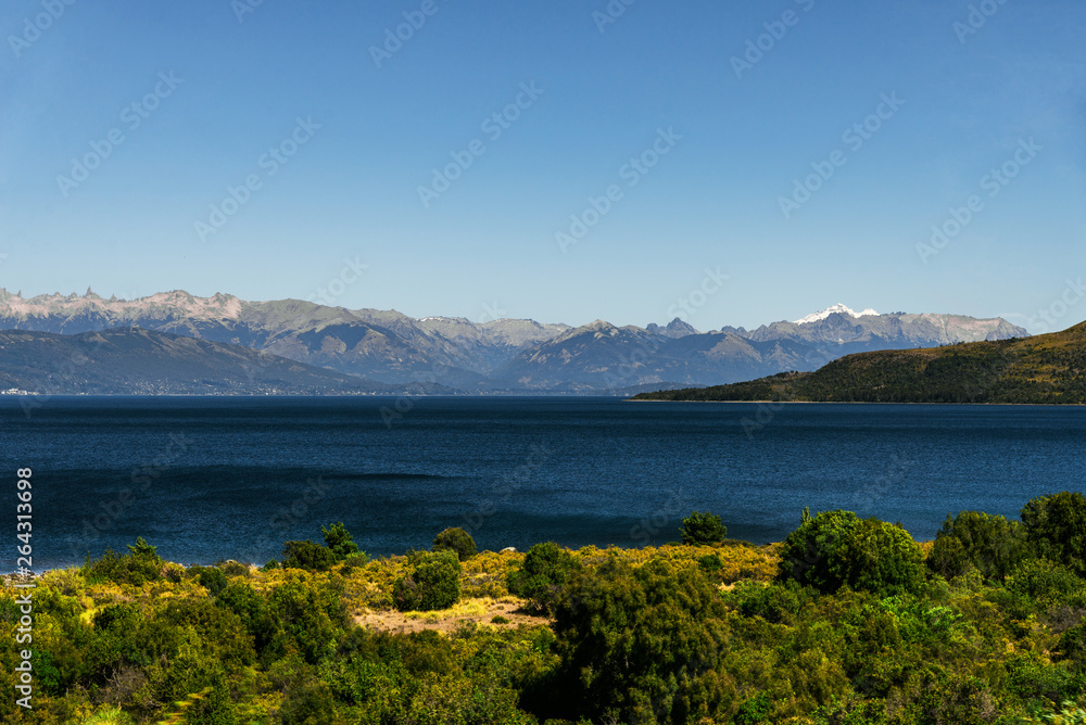 Scenic aerial nature colorful landscape photo of blue aquamarine lakes, rivers, Andes mountains, and green tree forest in Patagonia, Argentina Scenic aerial nature colorful landscape photo of blue aquamarine lakes, rivers, Andes mountains, and green tree forest in Patagonia, Argentina