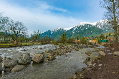 Beautiful landscape of the natural Lidder river stream  from the Himalayas mountain passing village of Lalipora Pahalgam, Kashmir,India. It is a popular tourist destination