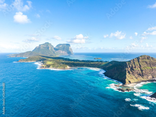 Stunning aerial panorama drone view of Lord Howe Island, an Australian pacific subtropical island in the Tasman Sea between Australia and New Zealand. Famous Ned's Beach in the foreground.