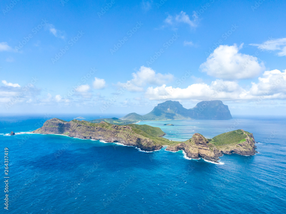 Fototapeta premium Stunning aerial panorama drone view of Lord Howe Island, a pacific subtropical island in the Tasman Sea between Australia and New Zealand. Lord Howe belongs to New South Wales, Australia.