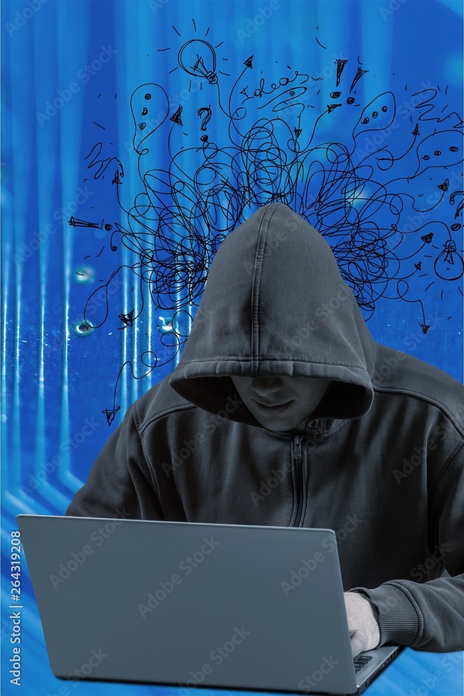Hacker using laptop. Hacking the Internet. Hacker using laptop. Hacking the Internet.