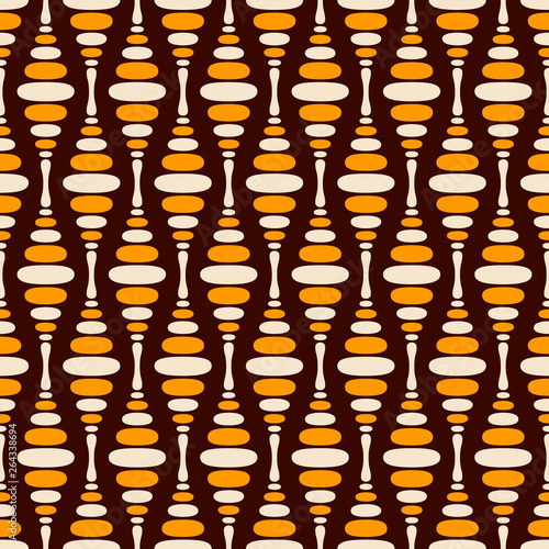 Abstract seamless pattern of regularly repeating smooth shapes on dark brown background.