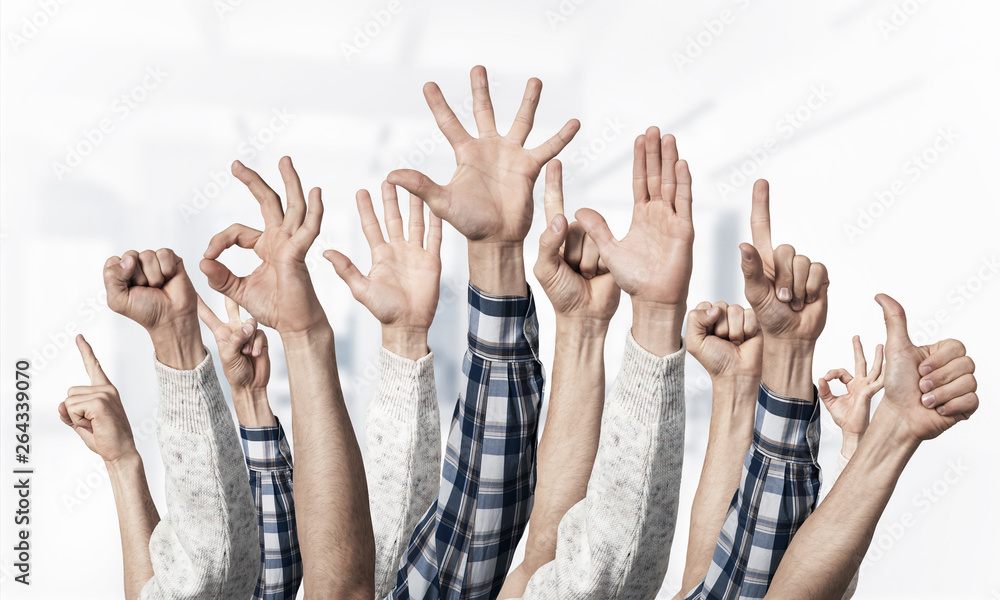Row of man hands showing various gestures