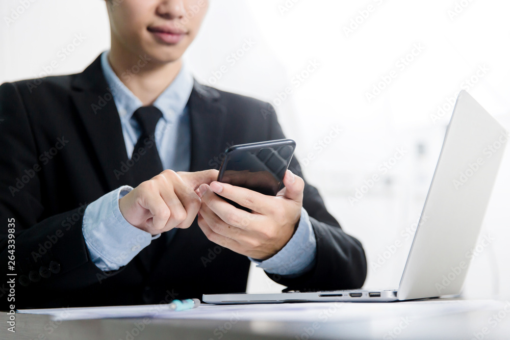 smart phone holding in businessman hands. Blurred background. Horizontal mockup smart phone holding in businessman hands. Blurred background. Horizontal mockup
