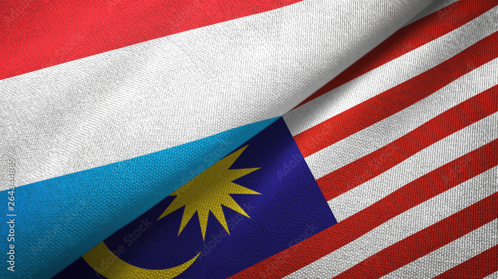 Luxembourg and Malaysia two flags textile cloth, fabric texture