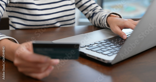 Woman use of laptop computer for online shopping
