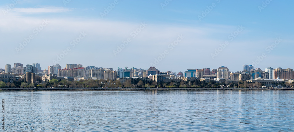 Baku, Azerbaijan - April 13, 2019: Panoramic sunny summer view of Baku, capital city of Azerbaijan. Panorama Baku from The Caspian Sea