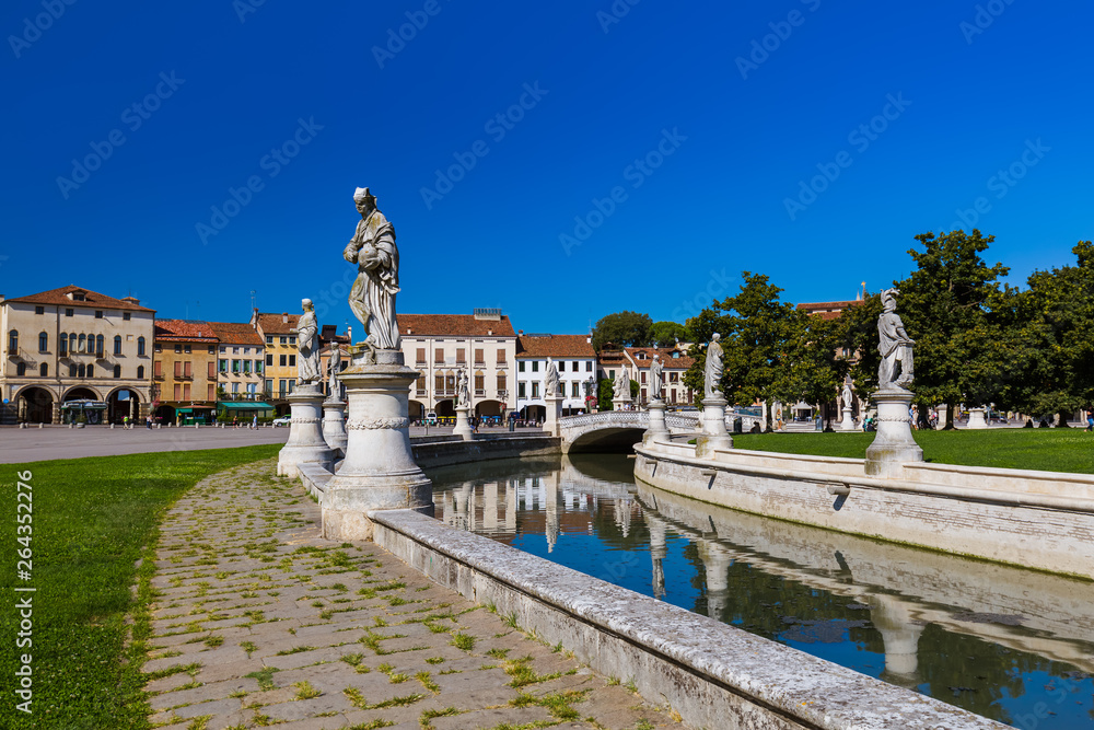 Canal with statues on prato della Valle in Padova Italy