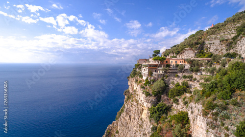 hotel in Paradise, beautiful panoramic view on the rocky bay at sunny day, travel to Europe, vacation travel tour, mountains hotel, building, architecture. copy space