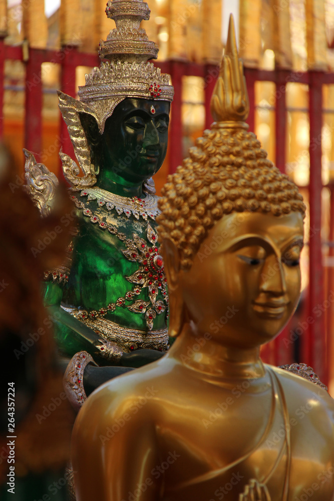 statues of buddha in a buddhist temple (Wat Doi Suthep) in chiang mai (thailand)