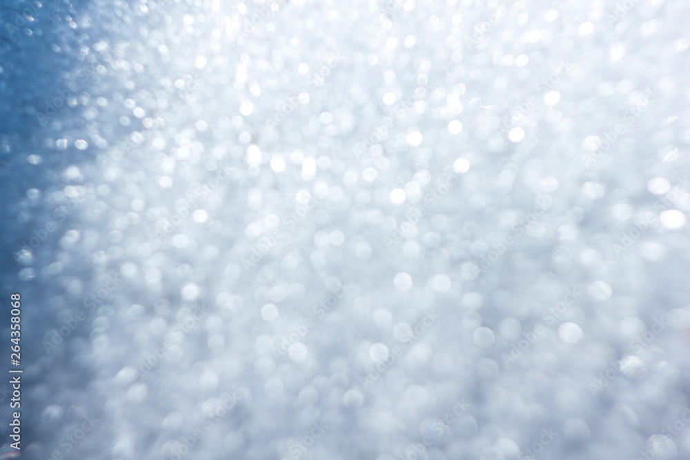 Glare blue background. Background from round highlights of white and blue. Glare blue background. Background from round highlights of white and blue.