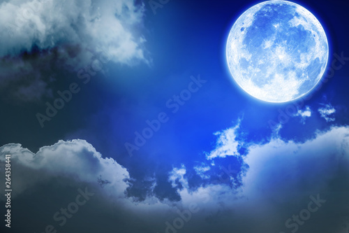 Full moon with blurred cloud and stars in the dark night