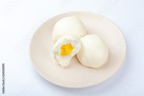 A dish of white bread is placed on a white background.